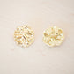 Gold asymetric metal button