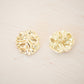 Gold asymetric metal button
