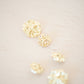Gold asymetric metal button