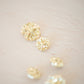 Gold asymetric metal button