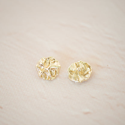 Gold asymetric metal button