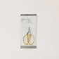 gold scissor i plastic and cardboard case