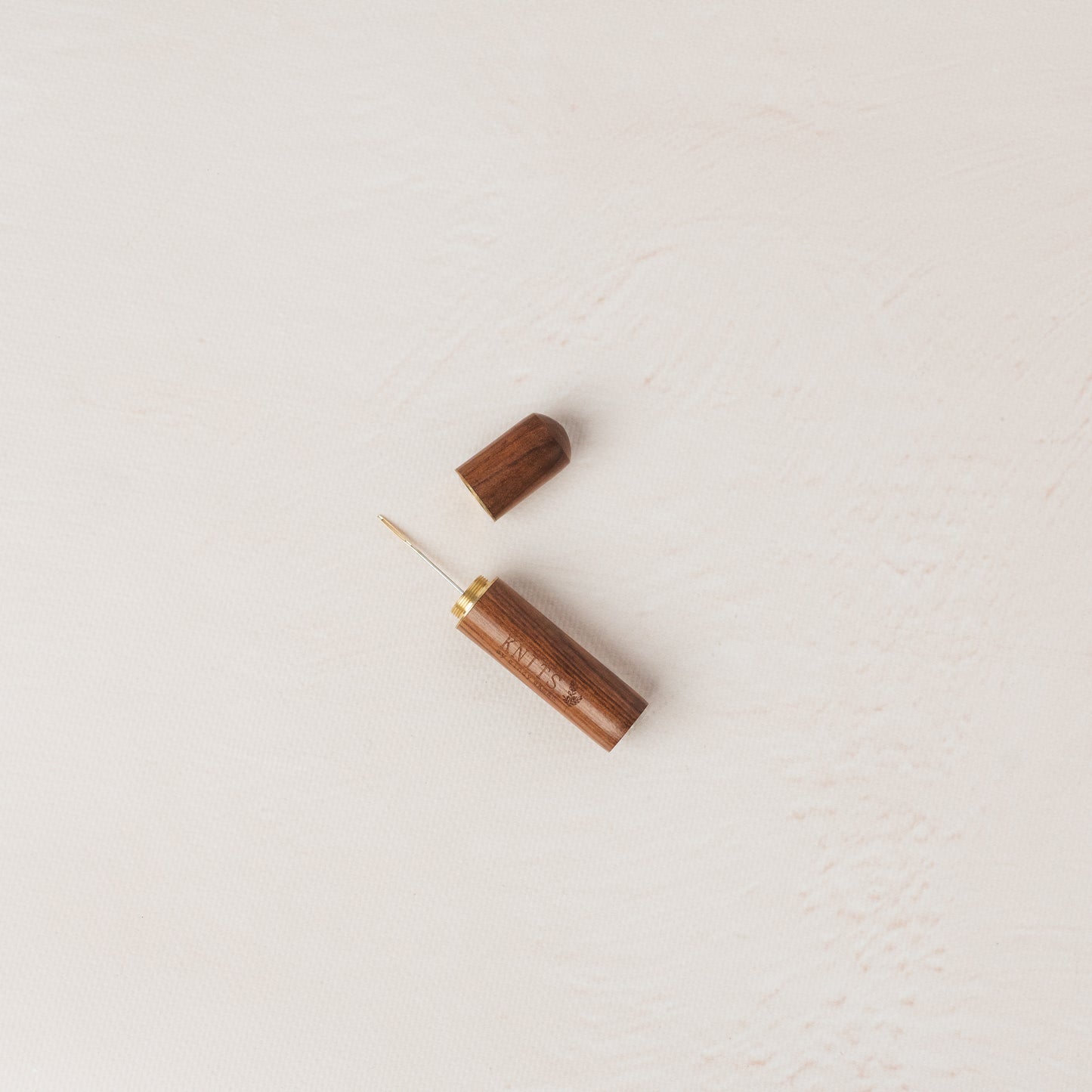 The KNITS wooden needle tube + needle