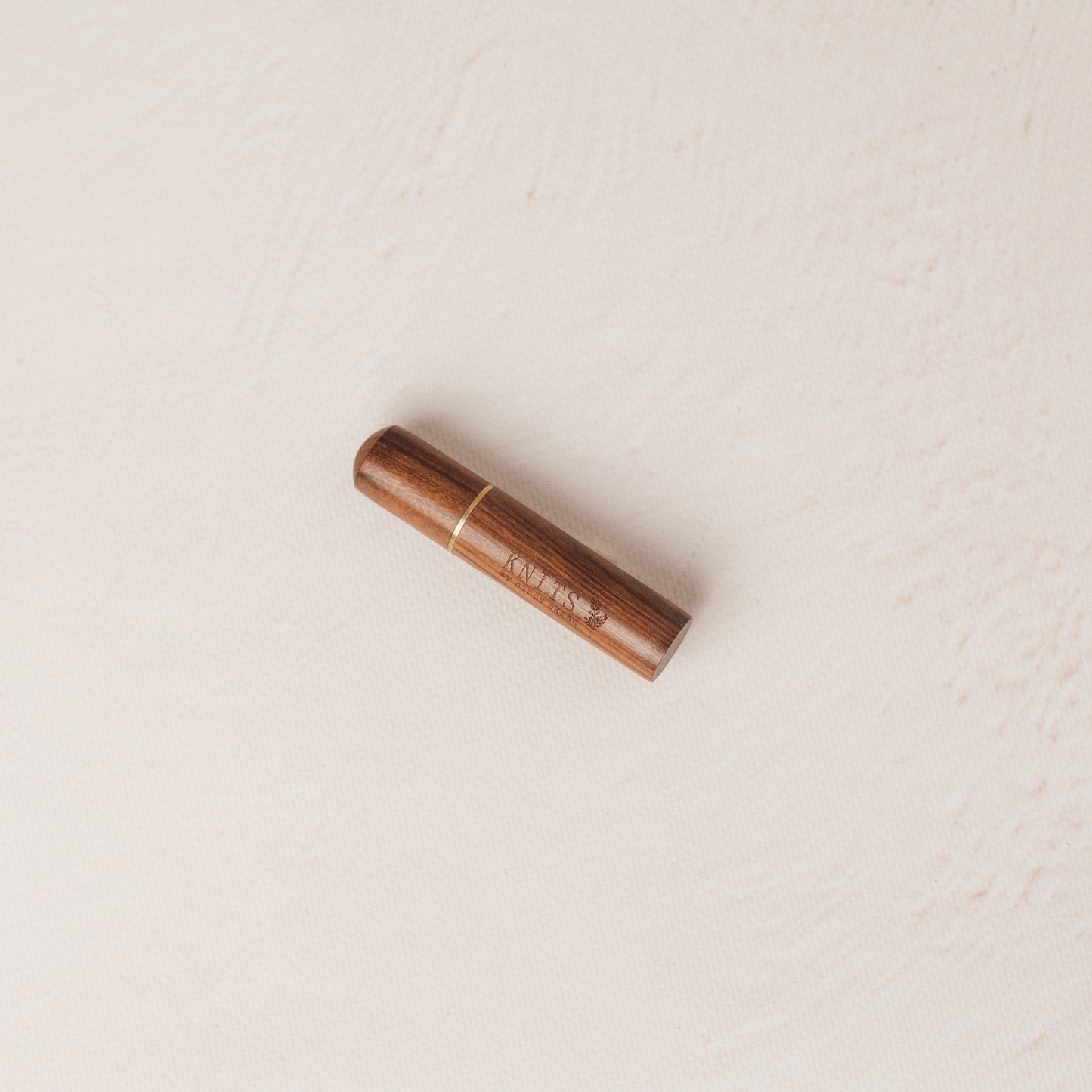 The KNITS wooden needle tube + needle