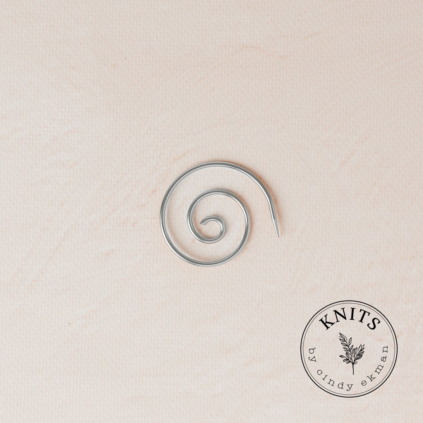 Spiral helping needle