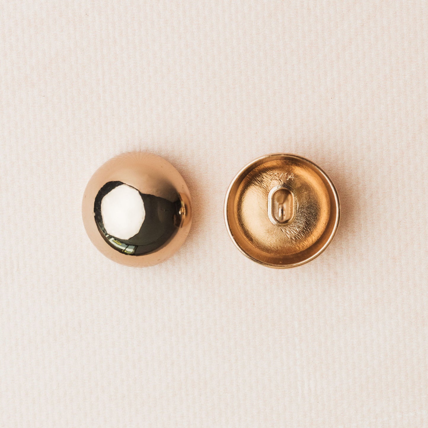 Metal buttons